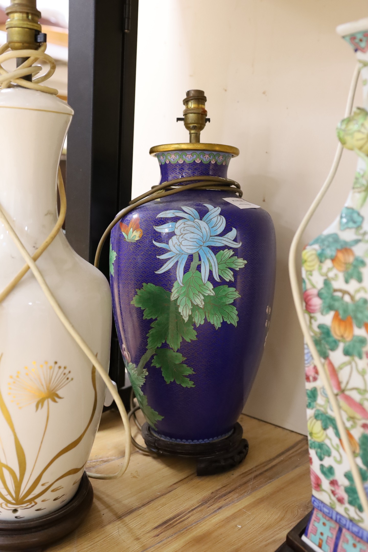 A large Chinese cloisonné enamel table lamp and two other table lamps (3)